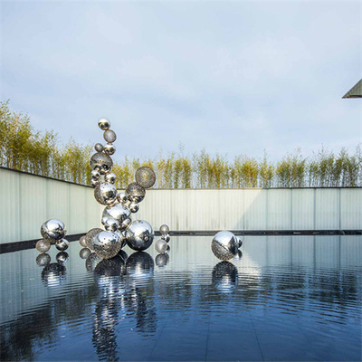 Escultura inoxidable de plata de la bola de acero del hueco decorativa para las fuentes