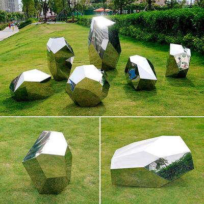 El espejo de piedra de la escultura del césped del metal resume la escultura de acero inoxidable